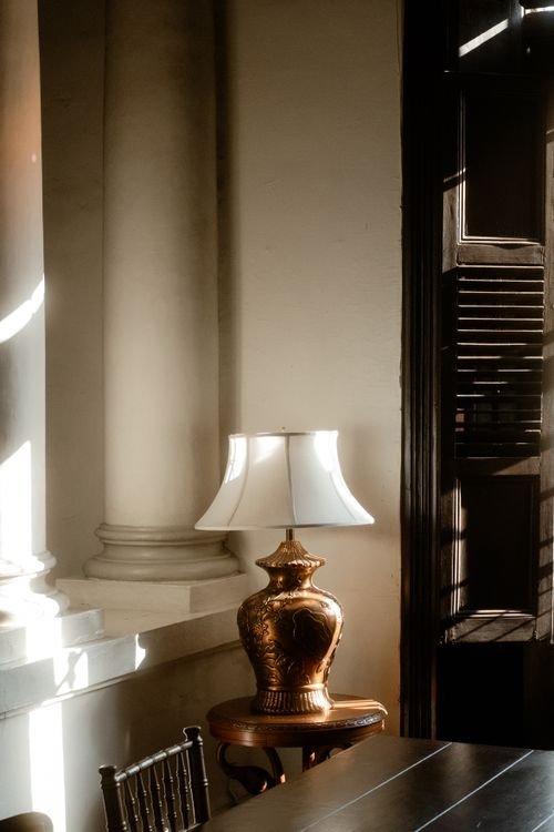 Decorative lamp glowing on a wooden table